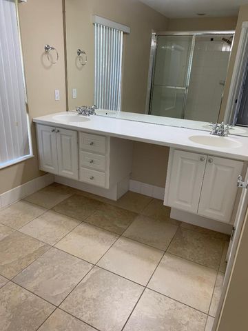 1176 Pinewood Lake Court, Greenacres, FL 33415