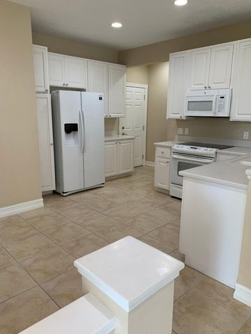 1176 Pinewood Lake Court, Greenacres, FL 33415