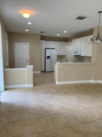 1176 Pinewood Lake Court, Greenacres, FL 33415