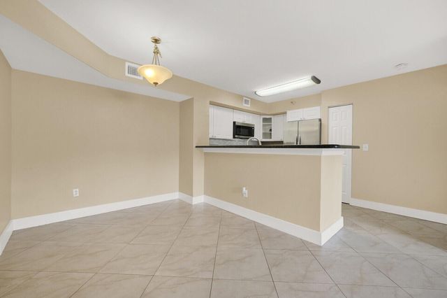 110 Yacht Club Way 105, Hypoluxo, FL 33462