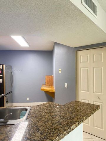 8901 Wiles Rd 103, Coral Springs, FL 33067