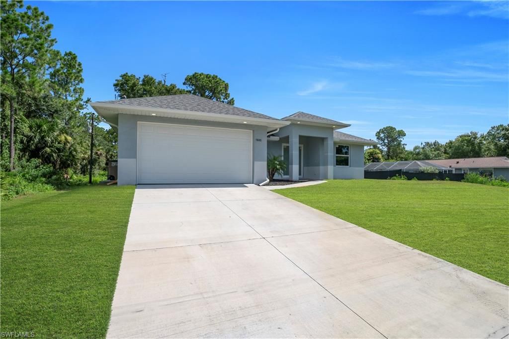 1605 E 6th ST, LEHIGH ACRES, FL 33972 — photo 2