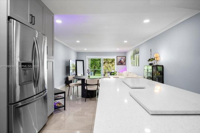 6001 N Falls Cir Dr 310, Lauderhill, FL 33319