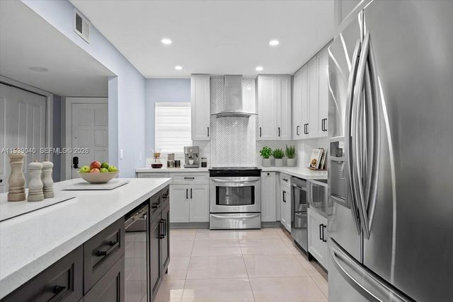 6001 N Falls Cir Dr 310, Lauderhill, FL 33319