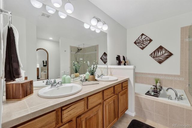 610 Clarendon Loop, Castle Pines, CO 80108