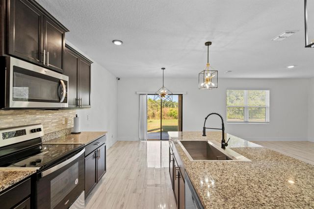 6455 NW Castlebrook Avenue, Port St Lucie, FL 34983