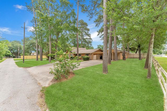 12115 Powder Horn Street, Pinehurst, TX 77362