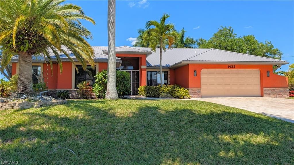 Image 2 of property listing at 1422 SW 4th AVE, Cape Coral, FL 33991