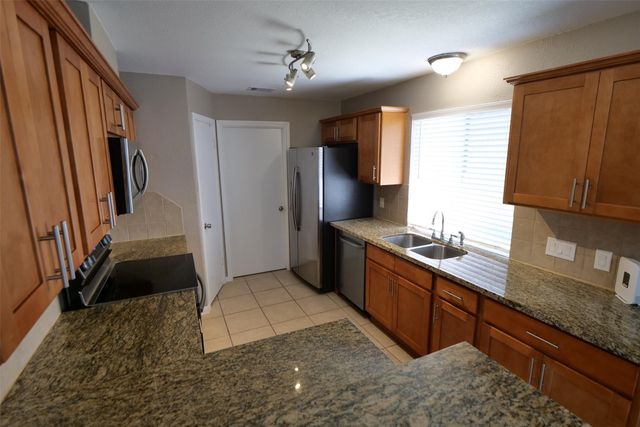 915 Comstock Springs Drive, Katy, TX 77450