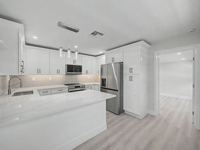 9298 Birmingham Drive, Palm Beach Gardens, FL 33410