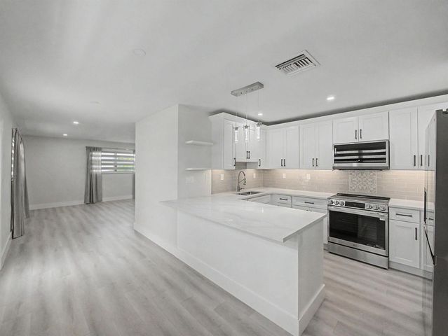 9298 Birmingham Drive, Palm Beach Gardens, FL 33410