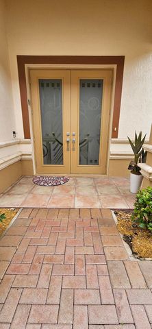 16117 Emerald Estates Drive, Weston, FL 33331