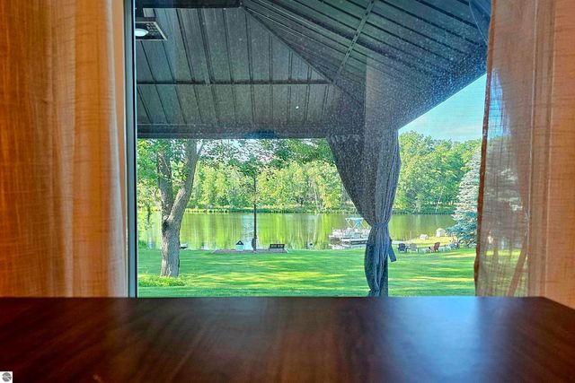 6760 W Shore Drive, Weidman, MI 48893