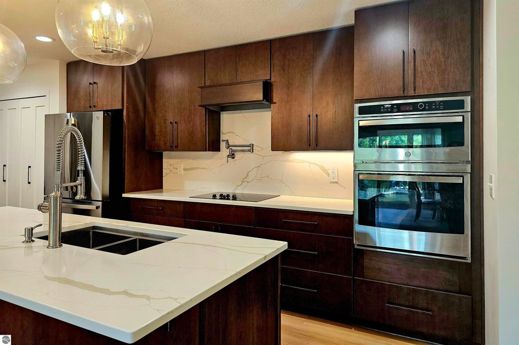 Image 12 of property listing at 6760 W Shore Drive, Weidman, MI 48893
