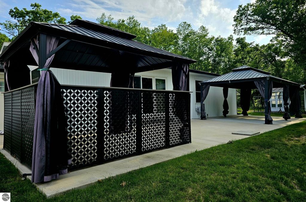 Image 5 of property listing at 6760 W Shore Drive, Weidman, MI 48893