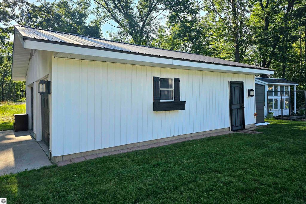 Image 50 of property listing at 6760 W Shore Drive, Weidman, MI 48893