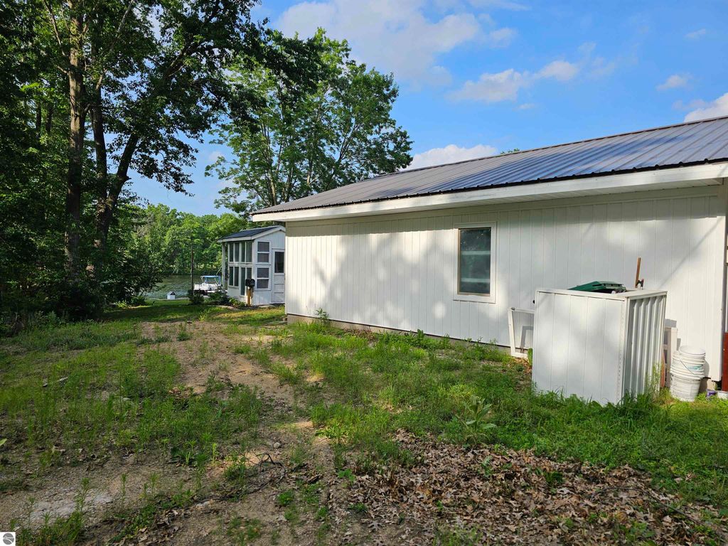 Image 51 of property listing at 6760 W Shore Drive, Weidman, MI 48893
