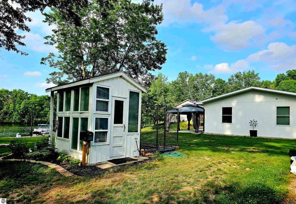 Image 53 of property listing at 6760 W Shore Drive, Weidman, MI 48893
