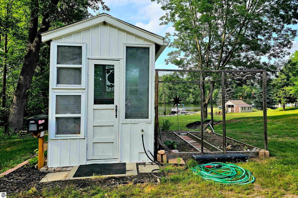 Image 54 of property listing at 6760 W Shore Drive, Weidman, MI 48893