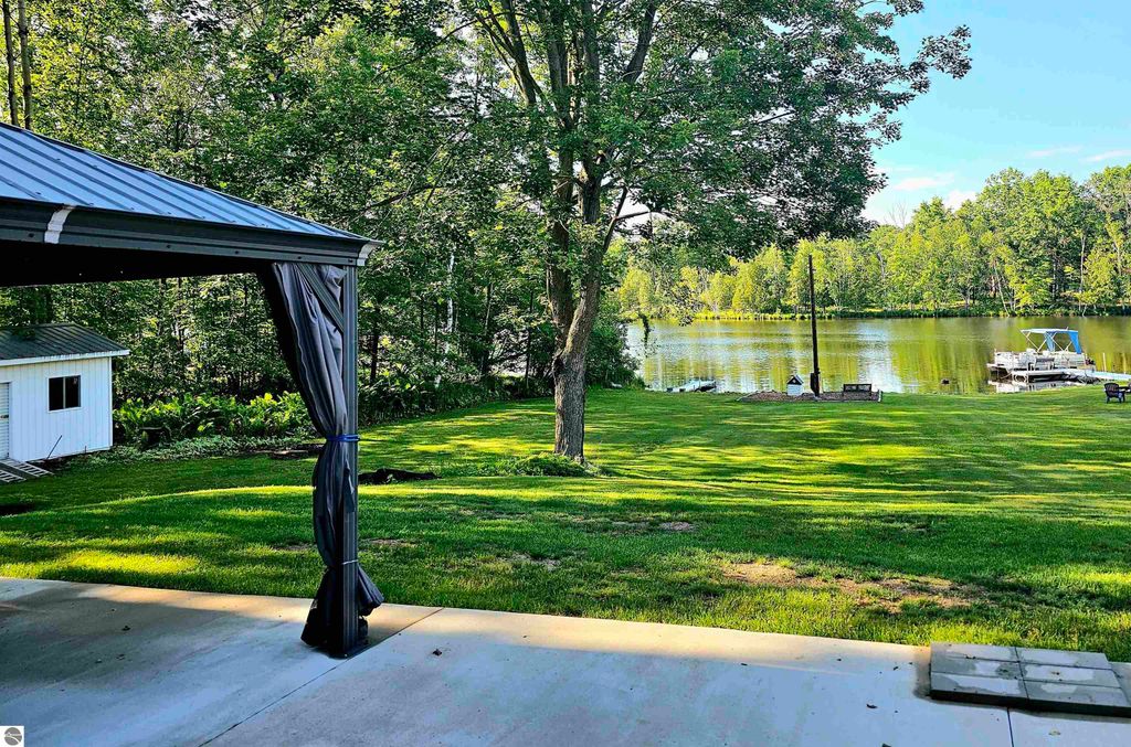 Image 60 of property listing at 6760 W Shore Drive, Weidman, MI 48893