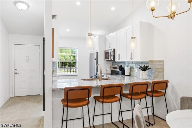 1714 Kings Lake BLVD 202, Naples, FL 34112