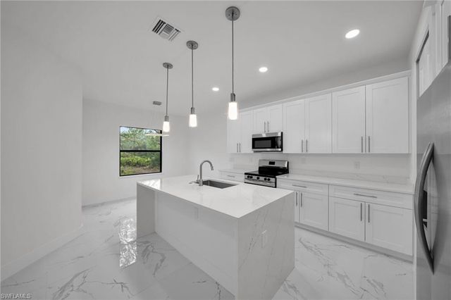 1216 Clayton AVE, Lehigh Acres, FL 33972