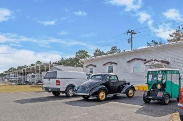 26920 RACQUET CIRCLE, Leesburg, FL 34748