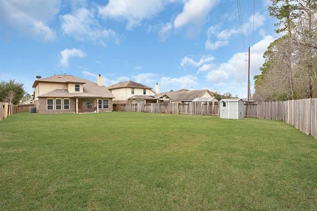 9803 Clanton Pines Drive, Humble, TX 77396