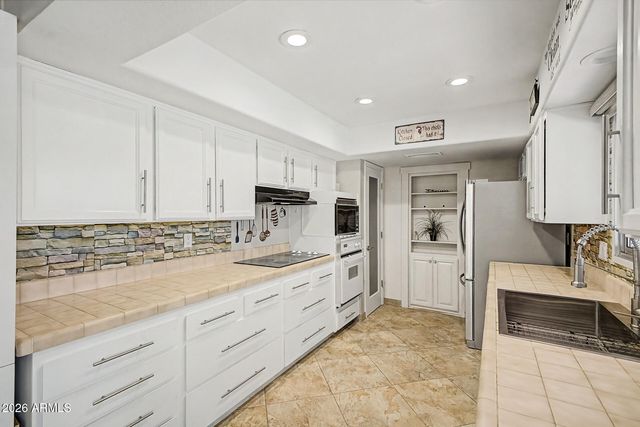 11407 N ARBOR Court, Sun City, AZ 85351