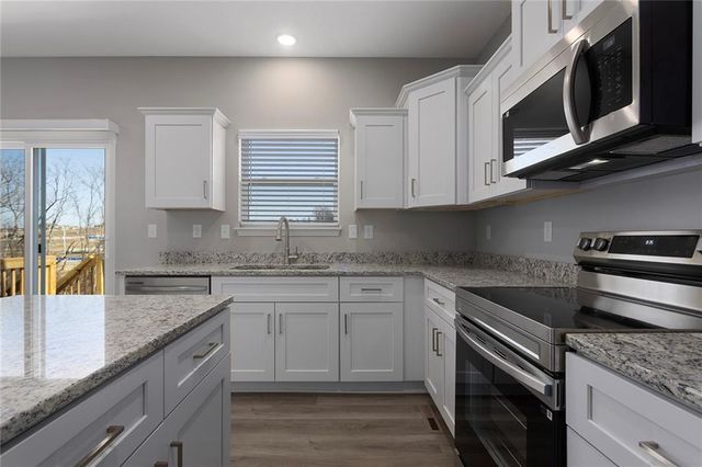702 Red Clover Court, Raymore, MO 64083