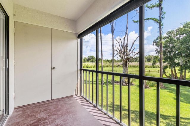 108 WOODLANDS COURT 108, Oldsmar, FL 34677