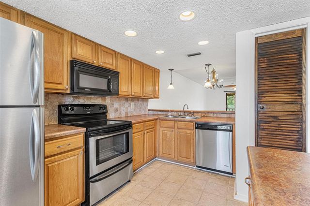 108 WOODLANDS COURT 108, Oldsmar, FL 34677