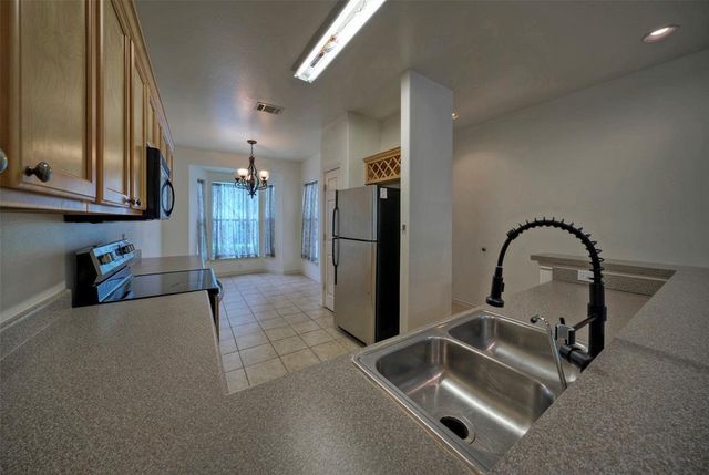 12289 Mulligan Glen CT C, Austin, TX 78753