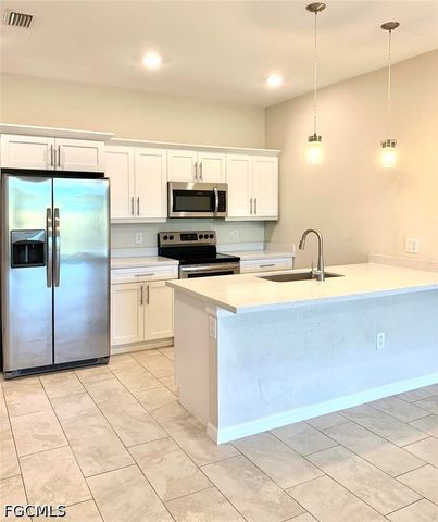 738 Gretchen AVE S, Lehigh Acres, FL 33973