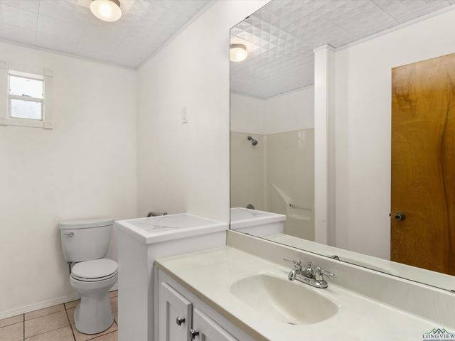 210 GILBERT ST, Lone Star, TX 75568