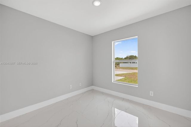702 Carbon Street, Lehigh Acres, FL 33974