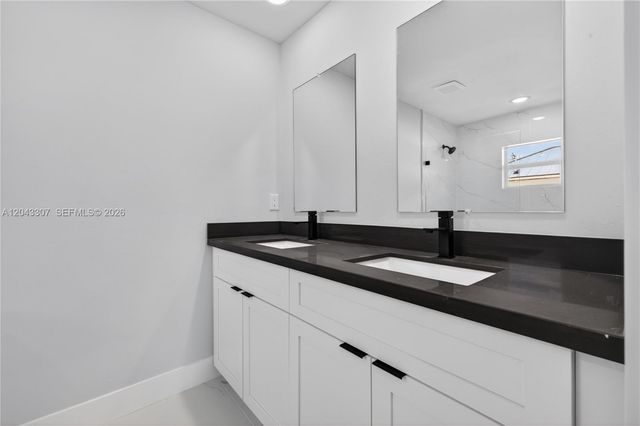 702 Carbon Street, Lehigh Acres, FL 33974