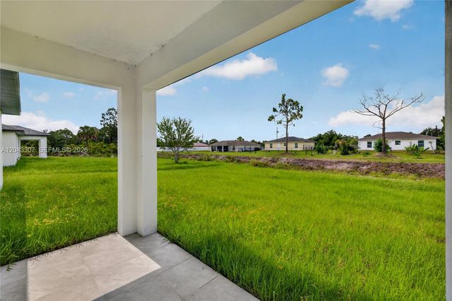 702 Carbon Street, Lehigh Acres, FL 33974