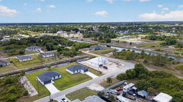 702 Carbon Street, Lehigh Acres, FL 33974