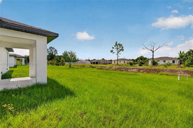 702 Carbon Street, Lehigh Acres, FL 33974