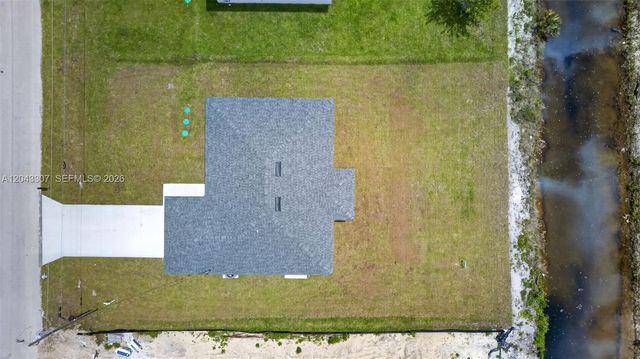 702 Carbon Street, Lehigh Acres, FL 33974