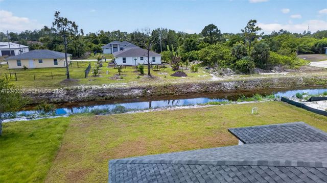 702 Carbon Street, Lehigh Acres, FL 33974