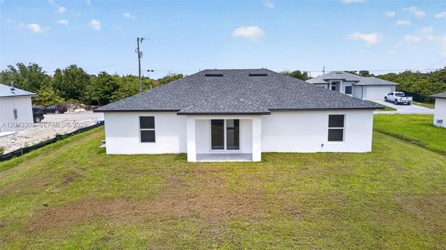 702 Carbon Street, Lehigh Acres, FL 33974