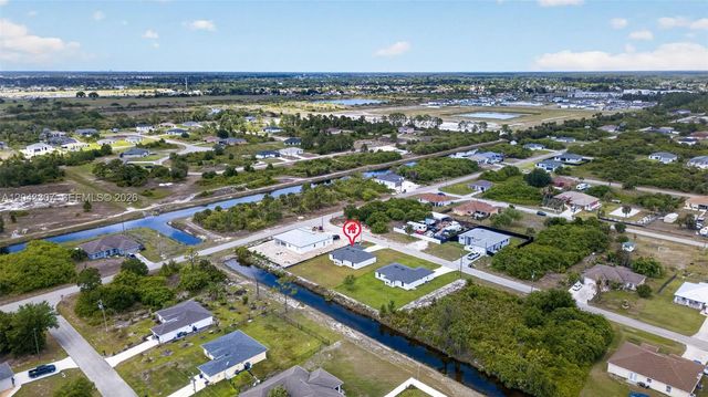 702 Carbon Street, Lehigh Acres, FL 33974