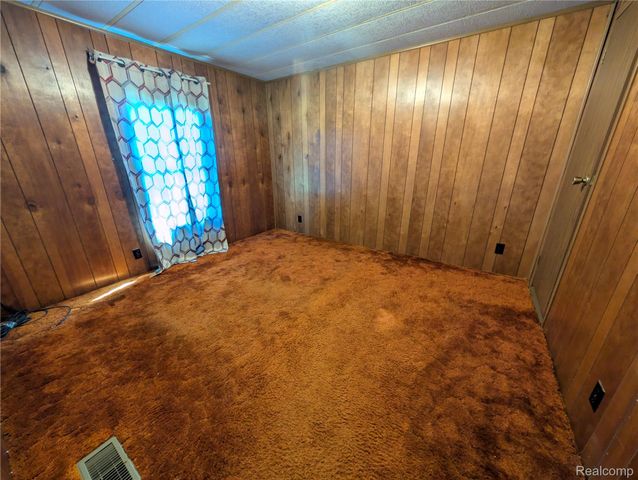 26 Carmell, Belleville, MI 48111