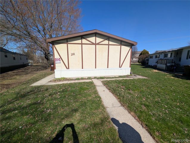 26 Carmell, Belleville, MI 48111