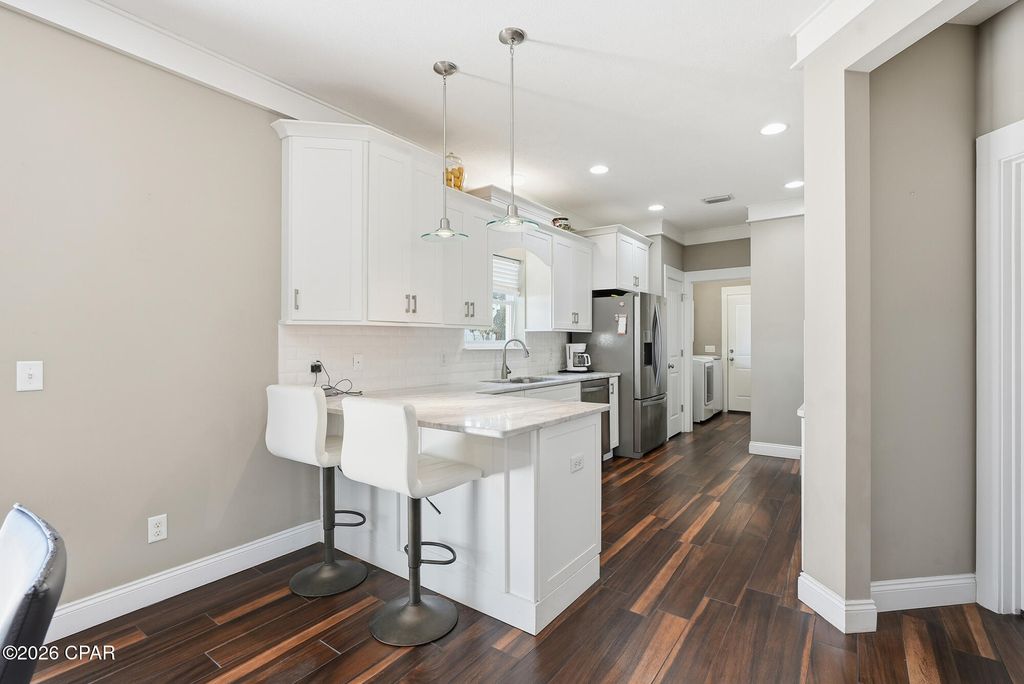 Image 10 of property listing at 215 Wiregrass Lane, Panama City Beach, FL 32407