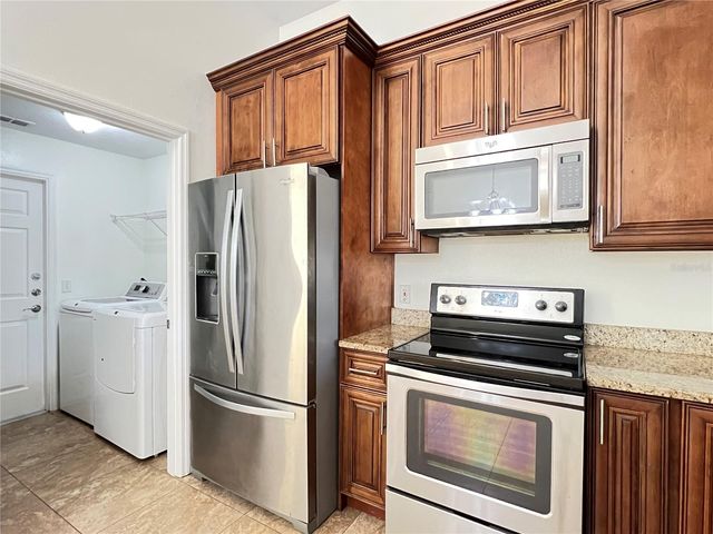 2859 BLOOMING ALAMANDA LOOP, Kissimmee, FL 34747