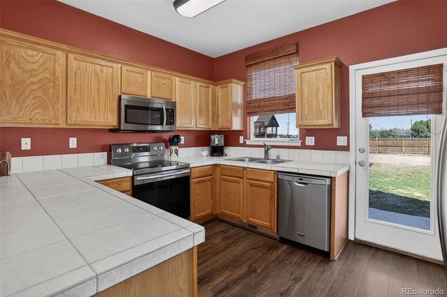 56981 E 24th Avenue, Strasburg, CO 80136