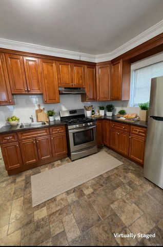 7027 68th Place, Glendale, NY 11385